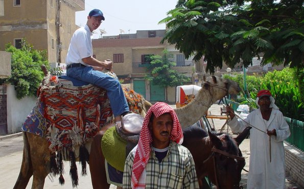 Milen sitting on camel