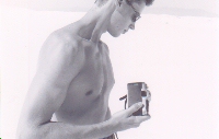 milen holding camera